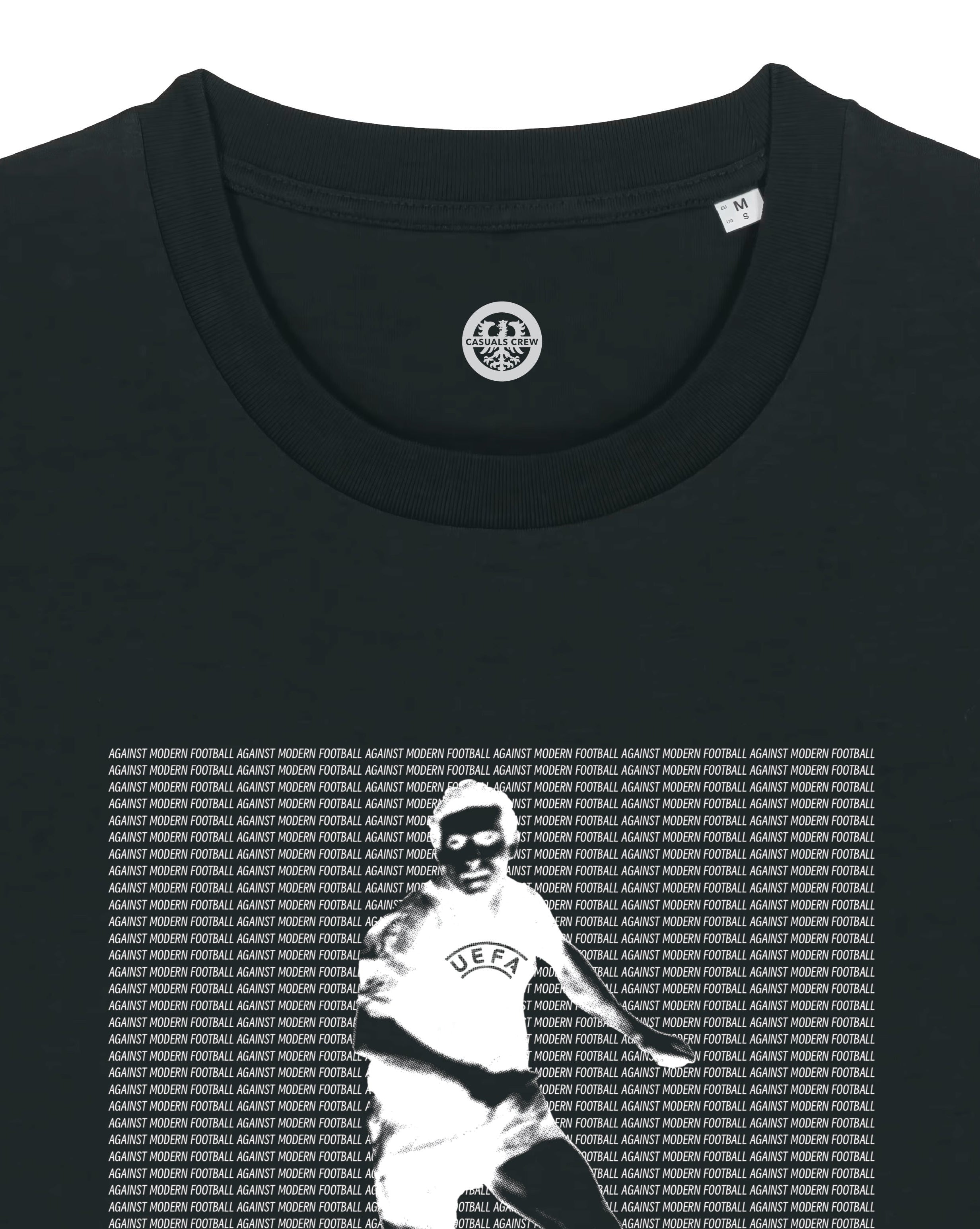 Black ultras t-shirt , surrounded by against modern football text, on a white background.