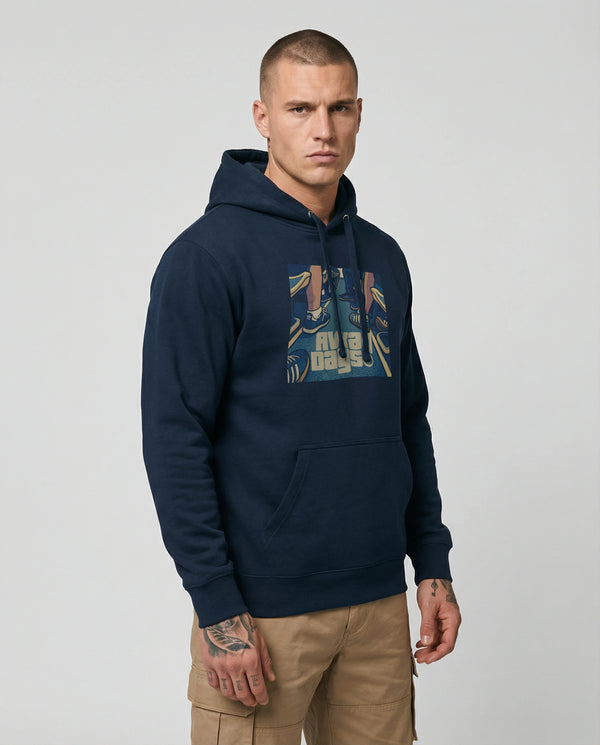 Man wearing a ultras away days navy hoodie with a graphic design on a light gray background