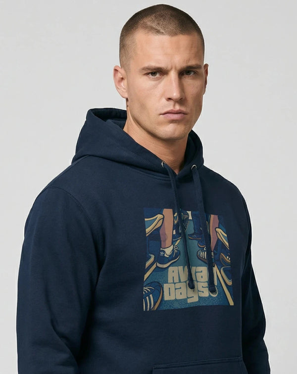 Man wearing a ultras away days navy hoodie with a graphic design on a light gray background
