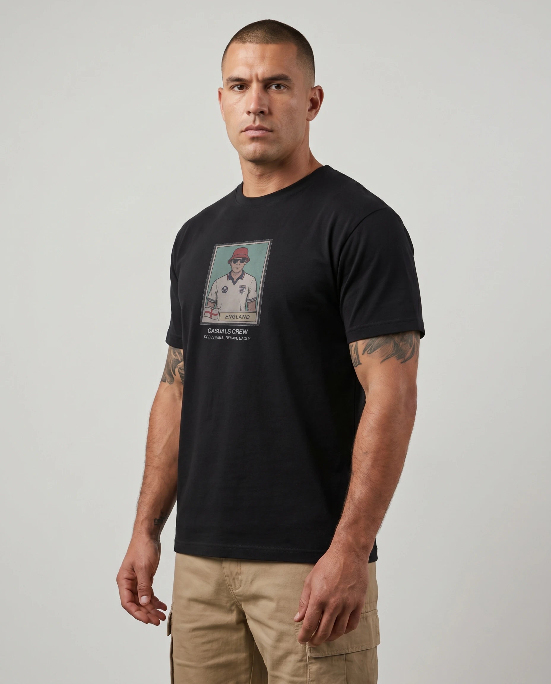 casual ultras wearing a black World Cup  t-shirt with a graphic design on a plain background