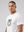 Casuals ultras Man wearing a white england World Cup t-shirt with a graphic design on a plain background